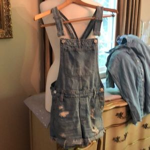 Madewell distressed short overalls.